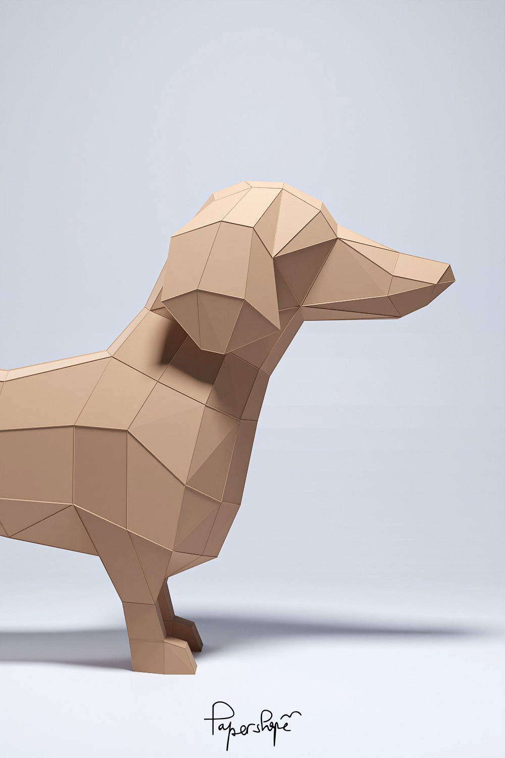 Papercraft-Dackel „Franz“ im Profil von rechts vor hellblauem Hintergrund, mit sichtbaren Kanten und klarer Faltstruktur