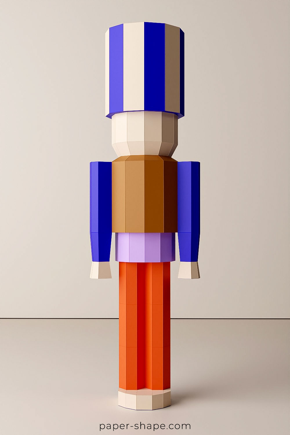 Colorful paper nutcracker against a beige background