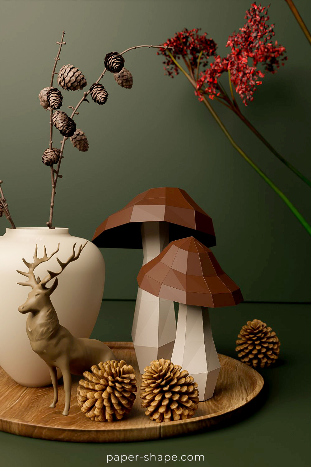 Autumnal table decoration with papercraft mushrooms next to natural materials