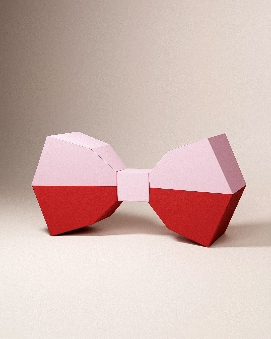 3D low-poly paper bow in blush pink and red, standing on a neutral studio background.